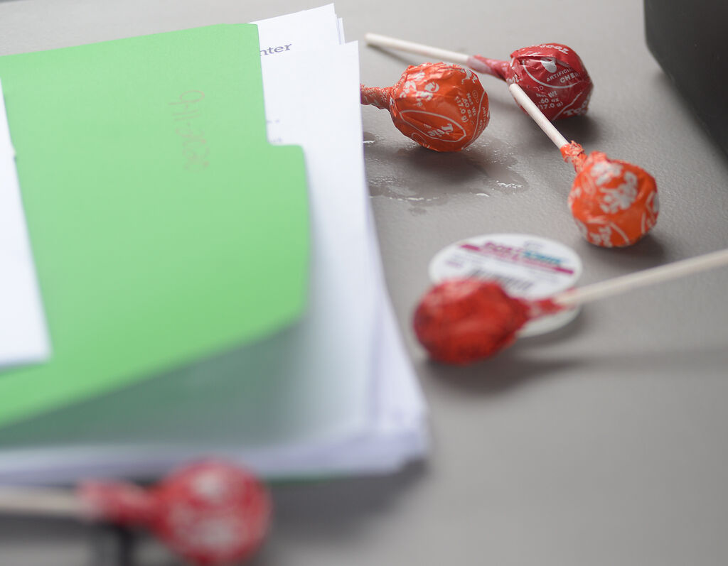 Medical workers passed out lollipops to patients who received a COVID-19 test